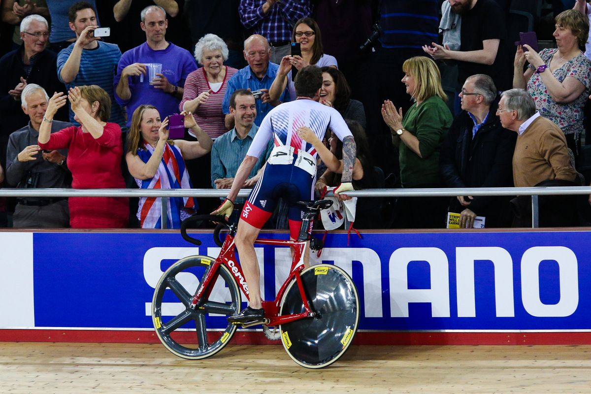 Bradley Wiggins kisses his wife Catherine