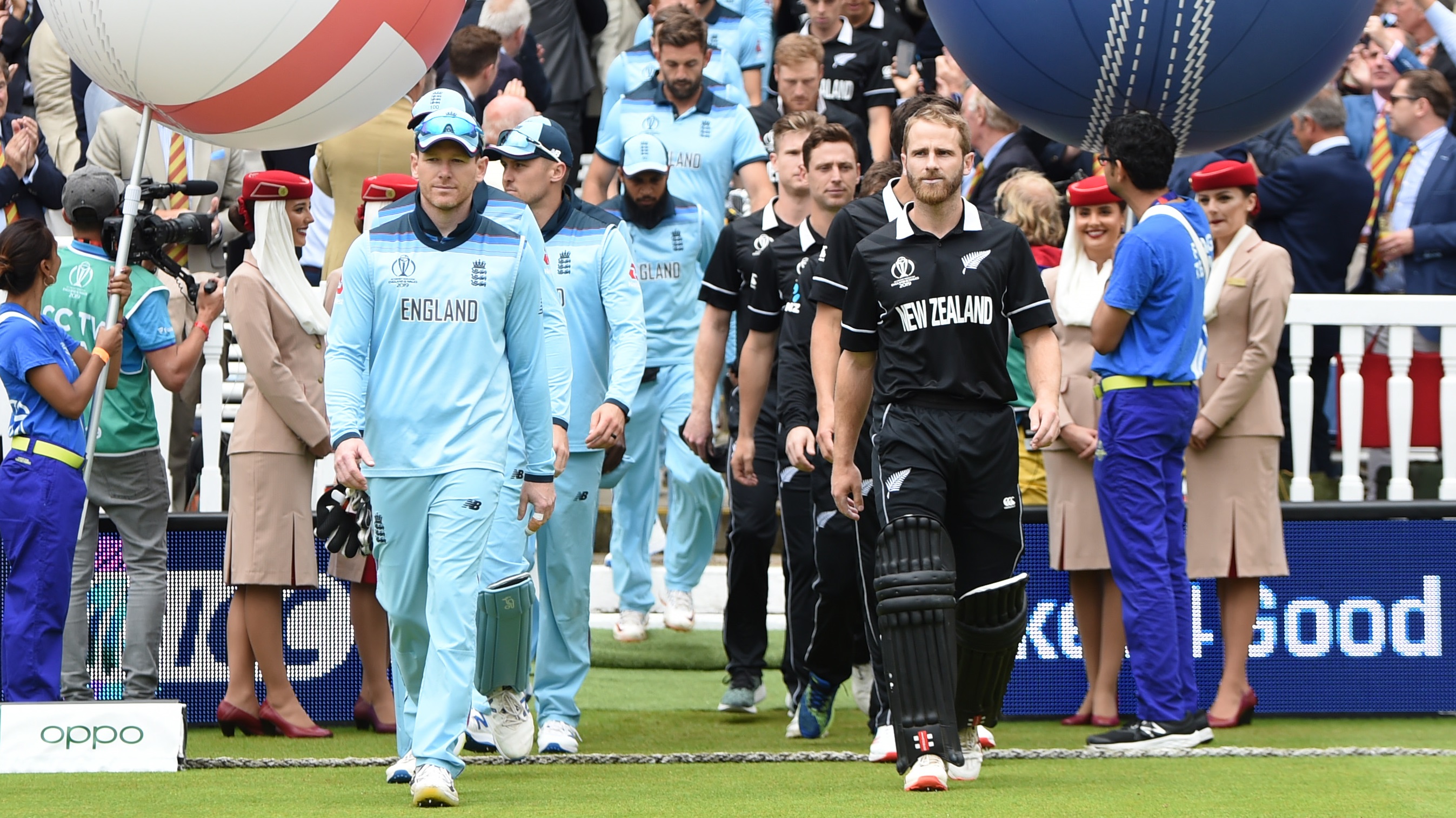 England and New Zealand teams walk on to the pitch during the Cricket World Cup 2019.