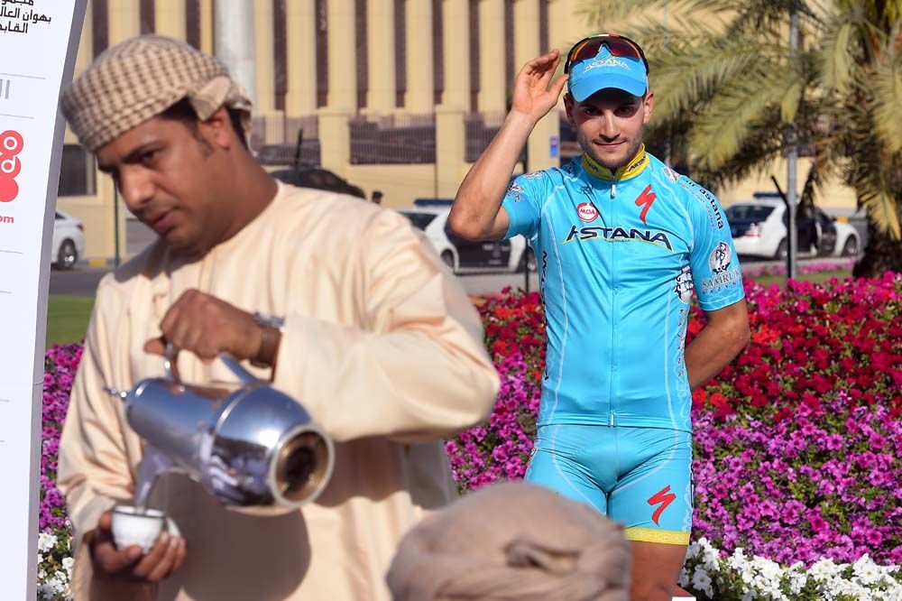 Andrea Guardini (Astana) waves to the crowd of officials