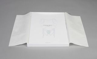 Relief-embossed Chaumet logo and carefully bevelled edges, using the brand's subtle mink and white colour scheme.