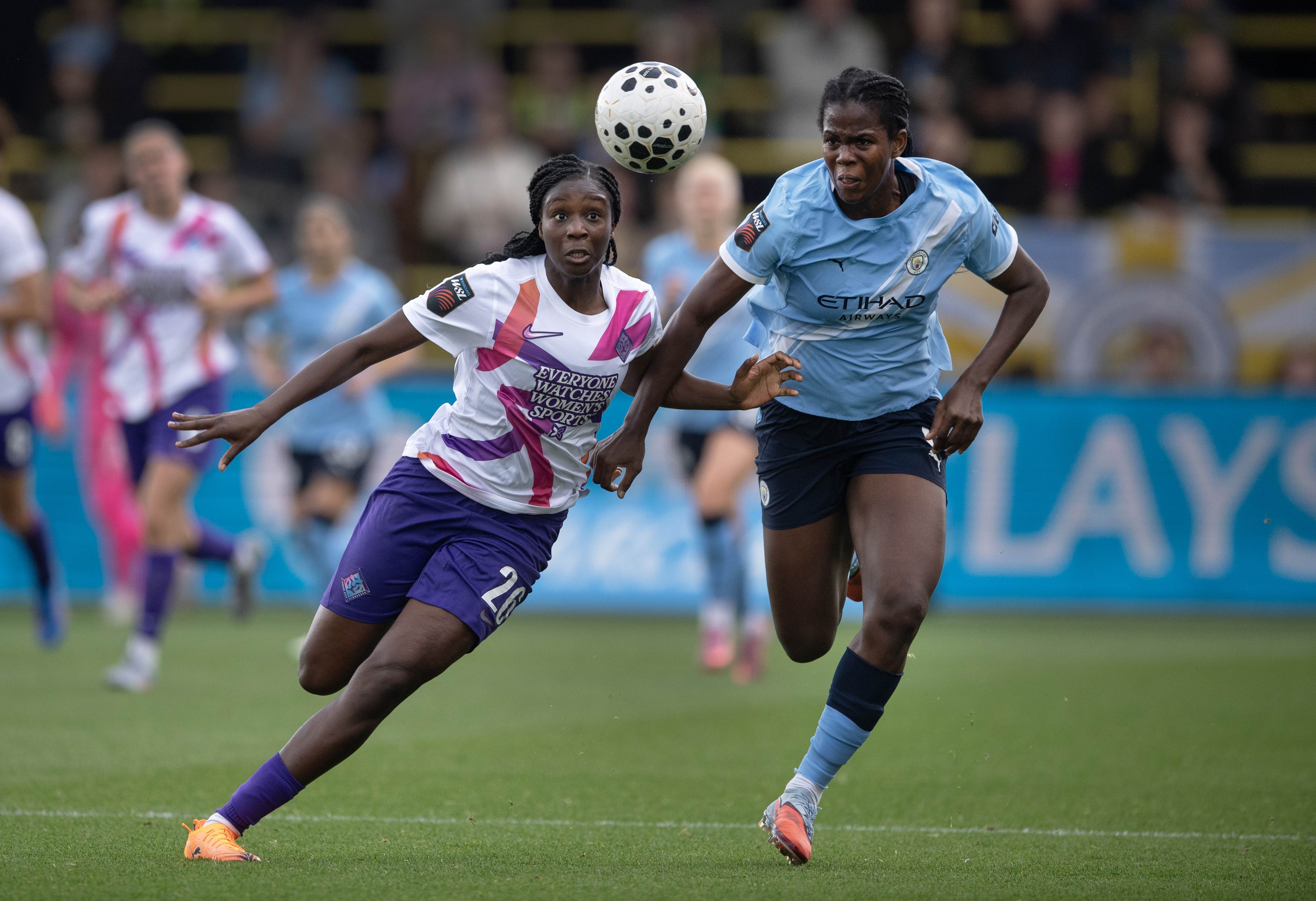 MANCHESTER, ENGLAND - SEPTEMBER 28: Khadija Shaw of Manchester City and Wassa Sangare of London City Lionesses in action during the Barclays Women's Super League match between Manchester City and London City Lionesses at Joie Stadium on September 28, 2025 in Manchester, England. 
