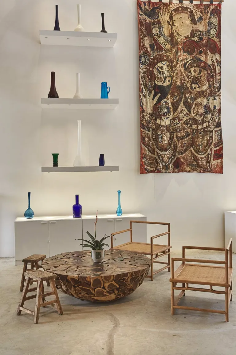 wall hanging and table and chairs in bangkok