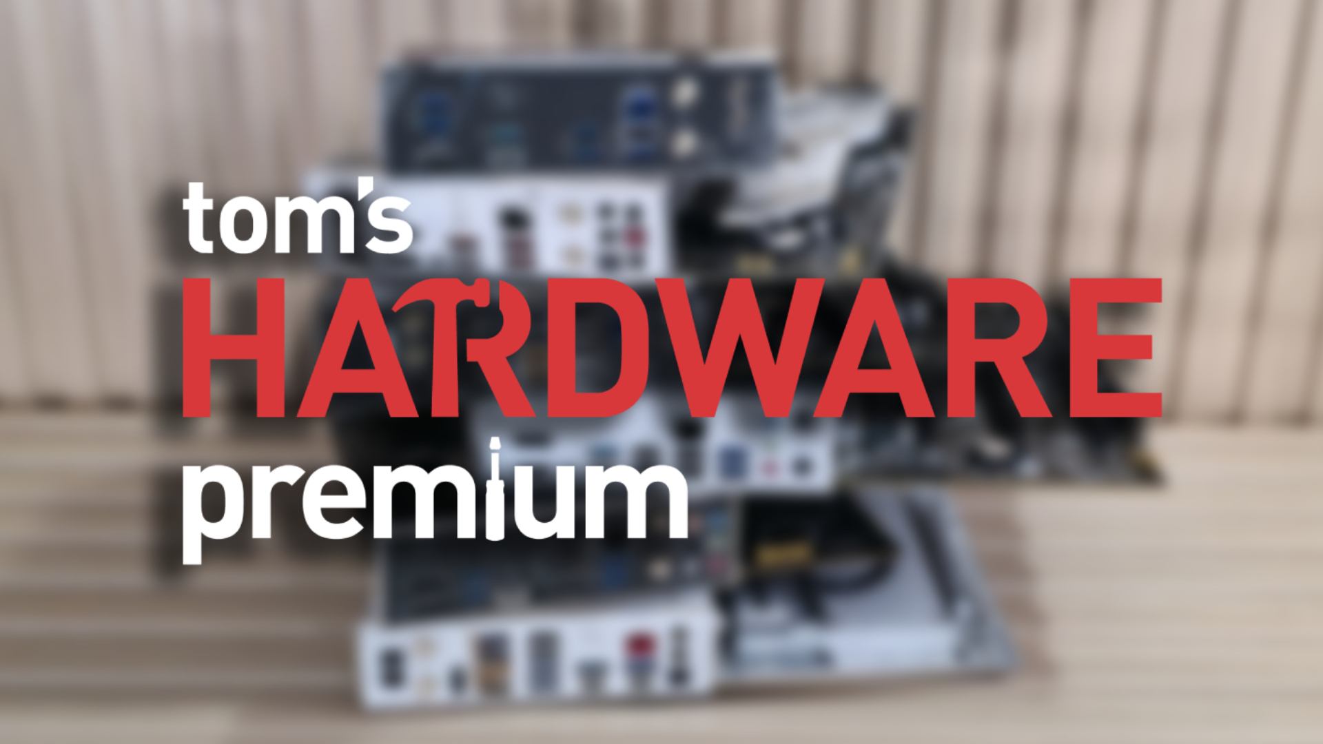 Tom's Hardware Premium Logo on a blurred background of Motherboards