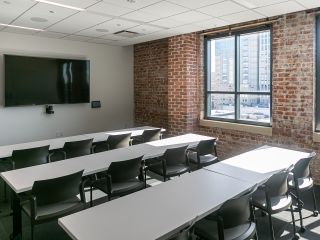 Square Training Room featuring 75-inch Sony Bravia Pro Display 4K HDR, Audix M70WD Flush-Mount Ceiling Microphones, Crestron Saros 2-Way In-Ceiling Speakers, and Logitech Rally Camera.