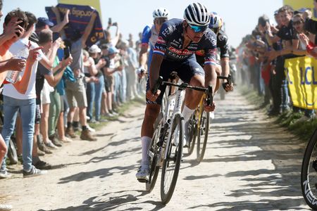 ROUBAIX FRANCE APRIL 17 Mathieu Van Der Poel of Netherlands and Team AlpecinFenix competes passing through MonsenPvle cobblestones sector during the 119th ParisRoubaix 2022 Mens Elite a 2572km one day race from Compigne to Roubaix ParisRoubaix WorldTour on April 17 2022 in Roubaix France Photo by Bas CzerwinskiGetty Images