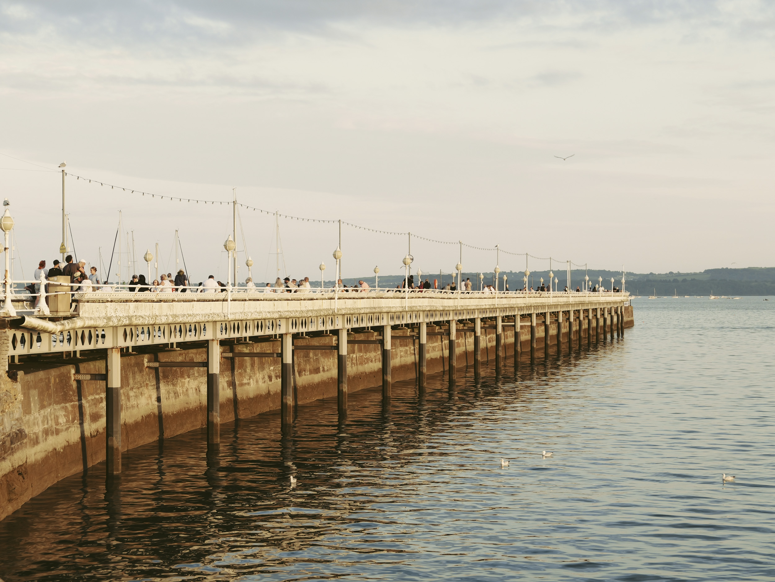 Sample image taken with the Panasonic Lumix L10; a pier at golden hour, with calm seas