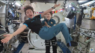 NASA astronauts Jessica Meir and Christina Koch complete a "flip trick" on the International Space Station while on a call with singer and talk-show host Kelly Clarkson on Nov. 14, 2019.