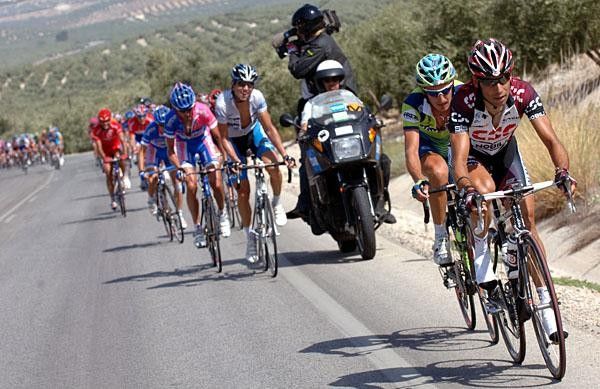 The peloton starts to feel the heat and the gradient. They stretched out on the lower parts of the climb and eventually fell into little pieces.