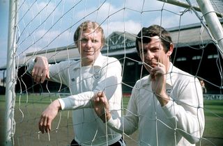 Alan Mullery with Bobby Moore at Fulham's Craven Cottage ground in 1975