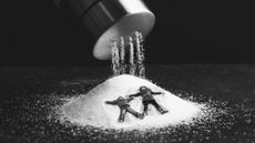 Photo collage of children making snow angels in a giant pile of salt, pouring out of a salt shaker above them