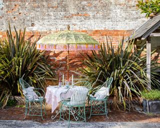 pretty frilled parasol with bistro set