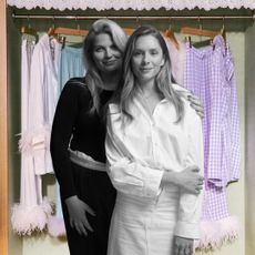 Sleeper cofounders stand in front of a rack of Sleeper pajamas