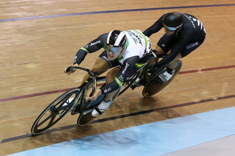 Matthew Glaetzer (L) of Australia competes against Eddie Dawkins of New Zealand in the Elite Men Sprint final