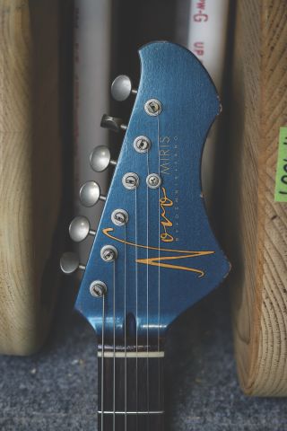 The headstock of Novo's Miris J guitar