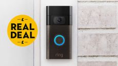 All-new Ring Doorbell on white brick wall with Real Deal badge