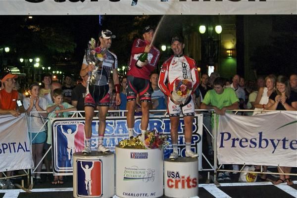 Men's winner Jonathan Cantwell uncorks the bubbly in Charlotte.