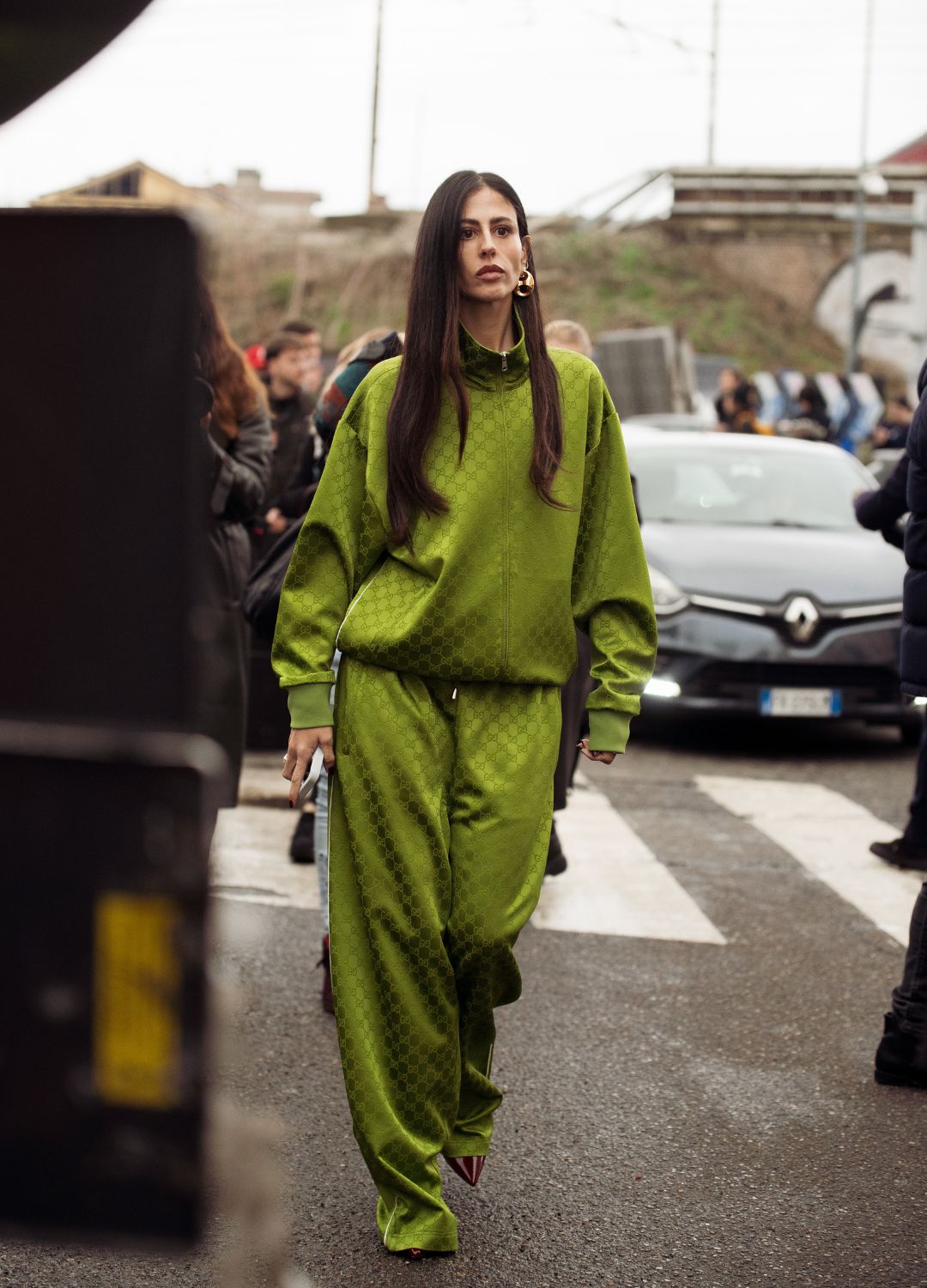 Gilda Ambrosio wears a green Gucci sport suit outside Gucci during the Milan Fashion Week - Womenswear Fall/Winter 2024-2025 on February 23, 2024 in Milan, Italy.