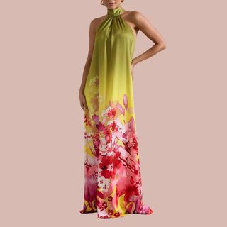 flat lay of woman wearing green and pink floral dress