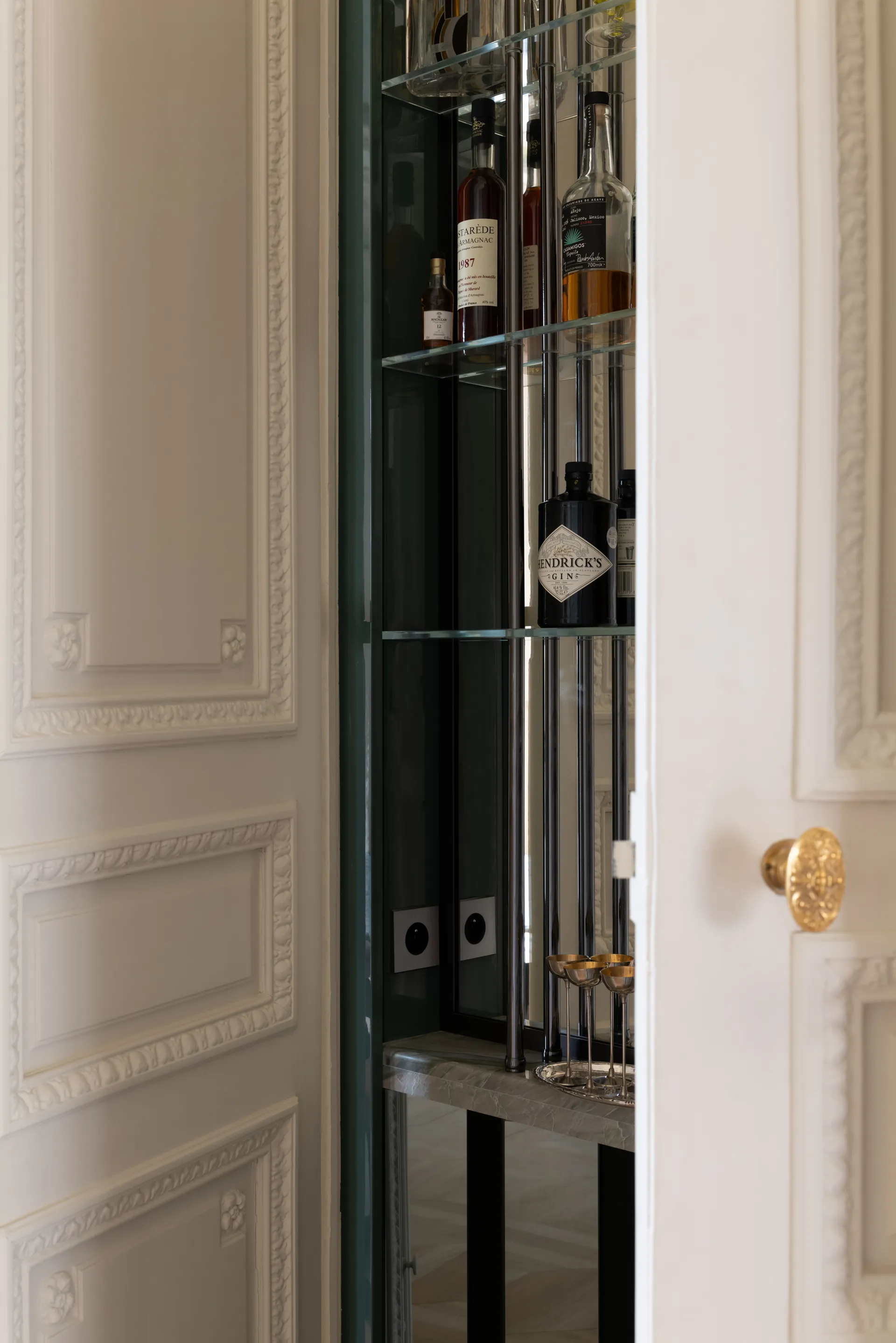Hidden bar behind molded door
