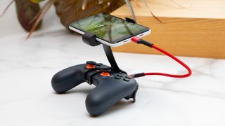 Google Stadia controller and smartphone