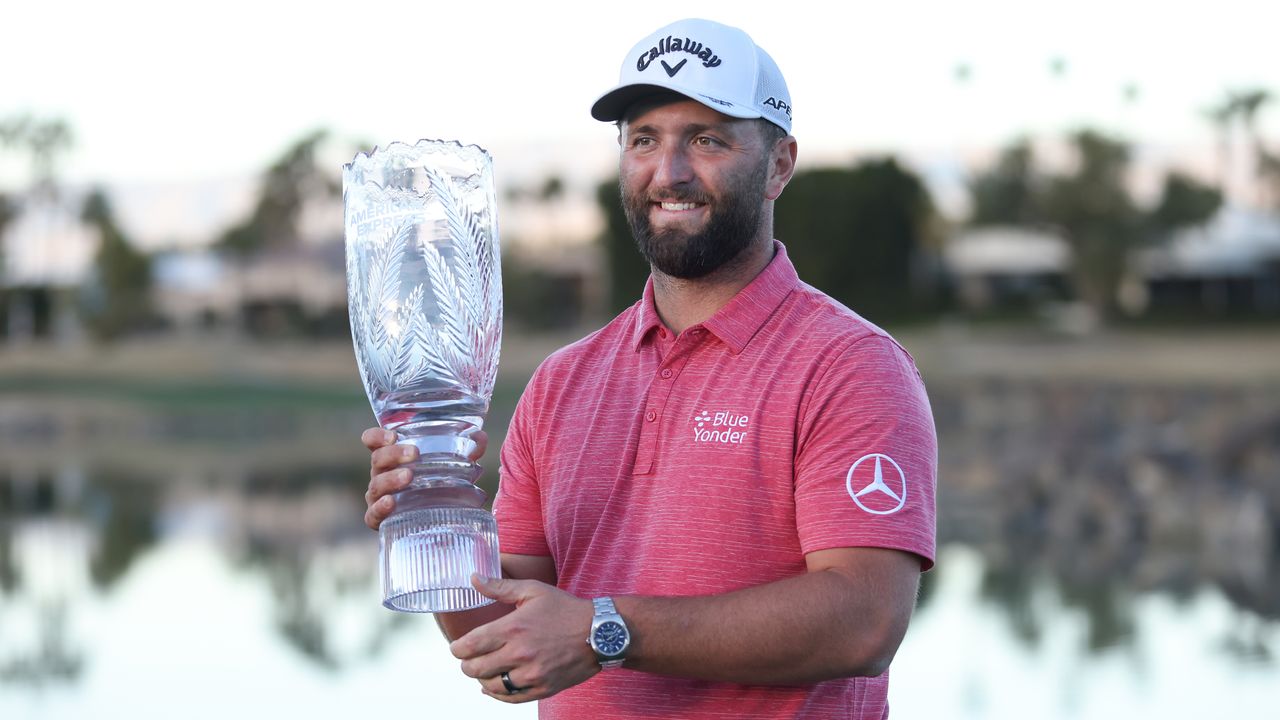 Jon Rahm with the trophy after his win at The American Express