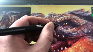 Close up of an artist drawing on a Cintiq 16 with a Pro Pen 2