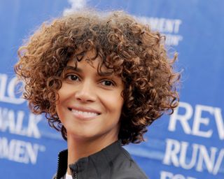 Halle Berry with a curly bixie haircut