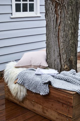 norsu interiors – seating around tree trunk