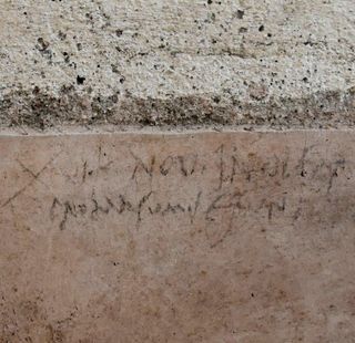 This graffiti, recently discovered on the wall of a Pompeii house, suggests that Mount Vesuvius blew its top in the autumn of A.D. 79, not in August as some had thought.