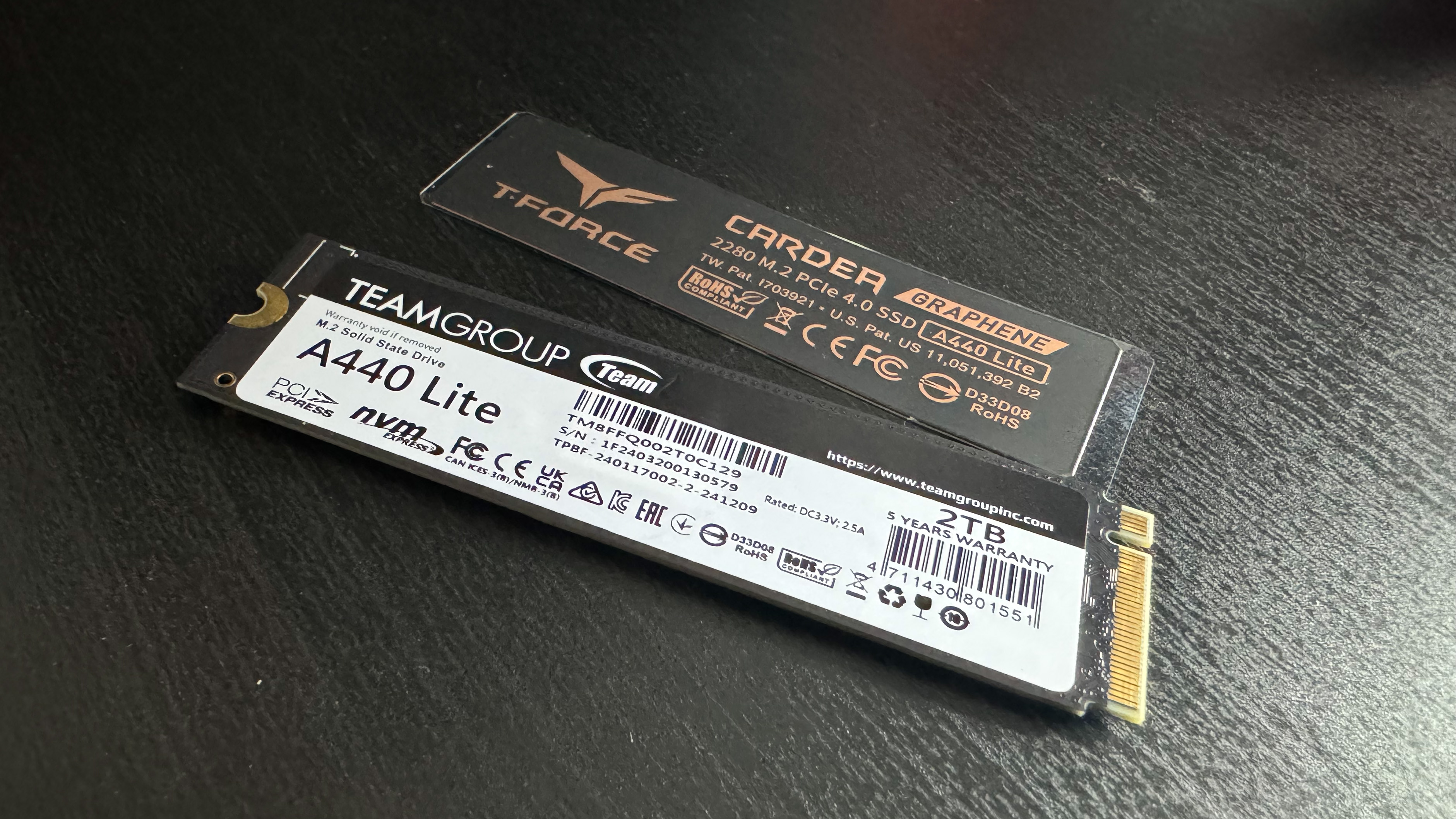 The T-Force A440 Lite next to its graphene heatsink sticker