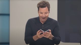 Jimmy Fallon holding the Pixel 10 Pro Fold during the Made by Google event