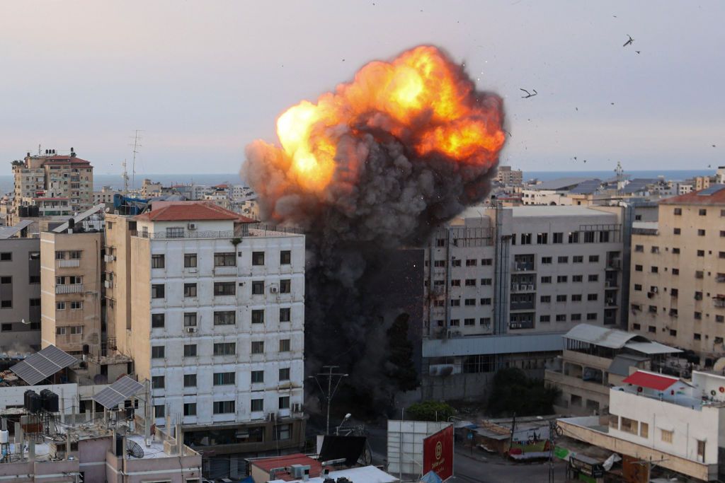 A fireball rises after an Israeli airstrike in Gaza