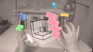 Someone playing Cubism, a VR game that allows passthrough viewing.