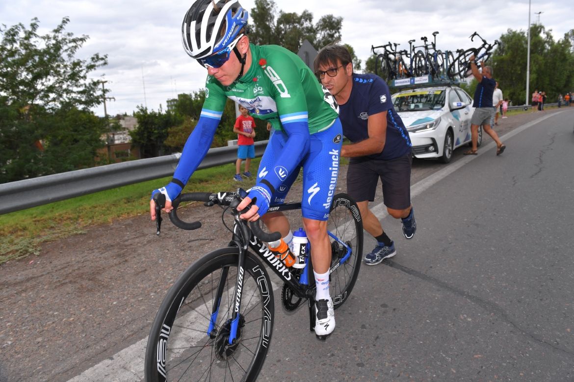 Remco Evenepoel gets a push after a mechanical