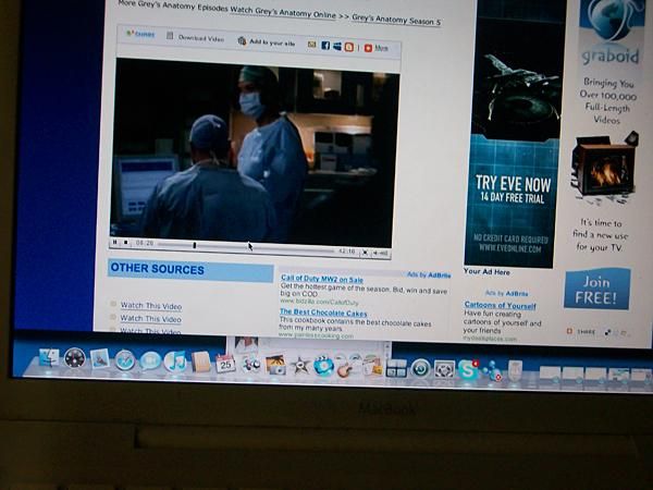 Watching my daily fill of Grey's Anatomy to pass the time while other people are watching The Hills and other heart warming chick shows up stairs to pass the time as well