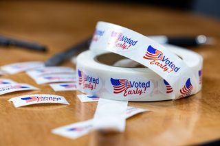 Voting stickers are seen at an early voting location in Mecklenburg County, North Carolina on October 25, 2024 ahead of the upcoming general election.