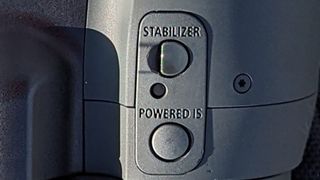 Binocular's image stabilization buttons