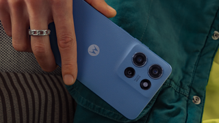 The Moto G 2025 in hand