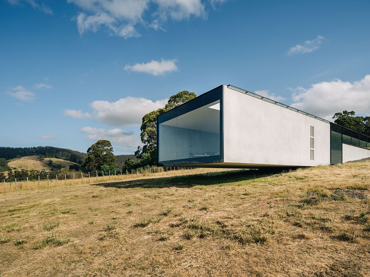 side view of koonya concrete tasmania house by room 11