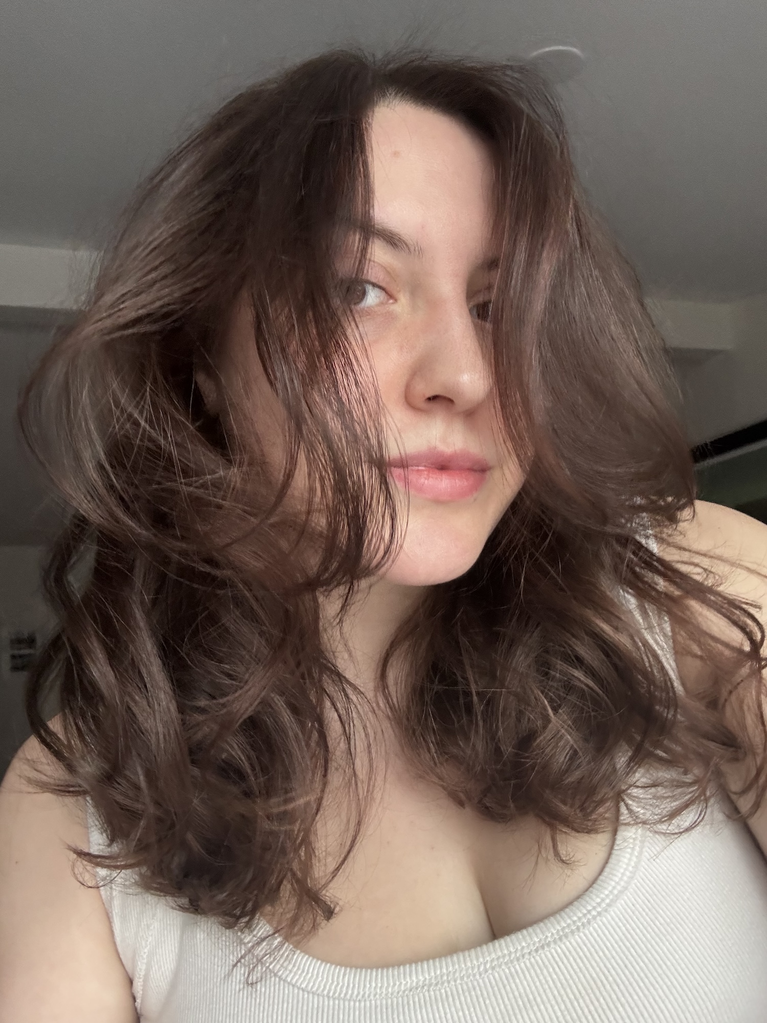 Sophia Vilensky's volumized hair after testing Oribe Spray.