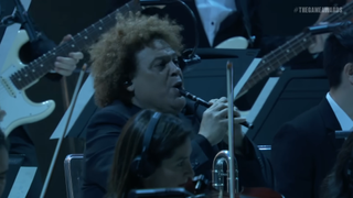 Flautist Pedro Eustache playing his instrument during The Game Awards 2022