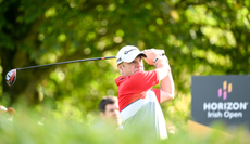 Paul McGinley hits a driver