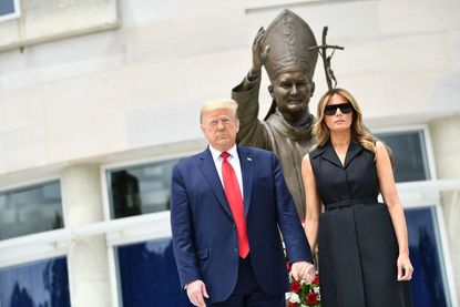President Donald Trump and First Lady Melania Trump visit the Saint John Paul II National Shrine