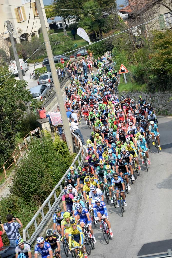 The peloton makes its way up the Ghisallo