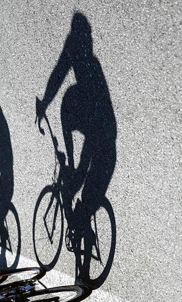 Shadow on the wall or maybe on the road.