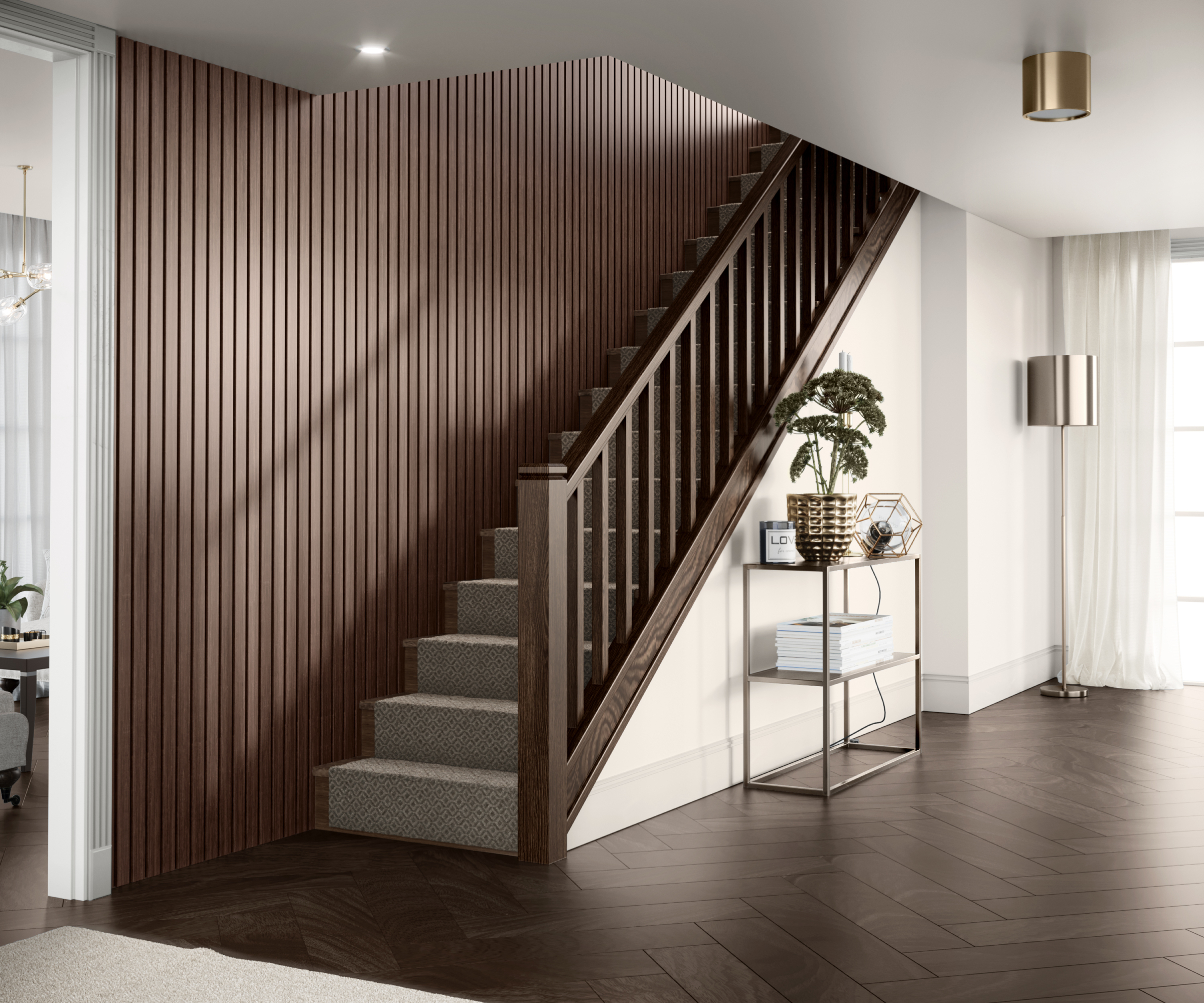 walnut vertical panelling on stair wall to match walnut flooring and staircase spindles and bannister