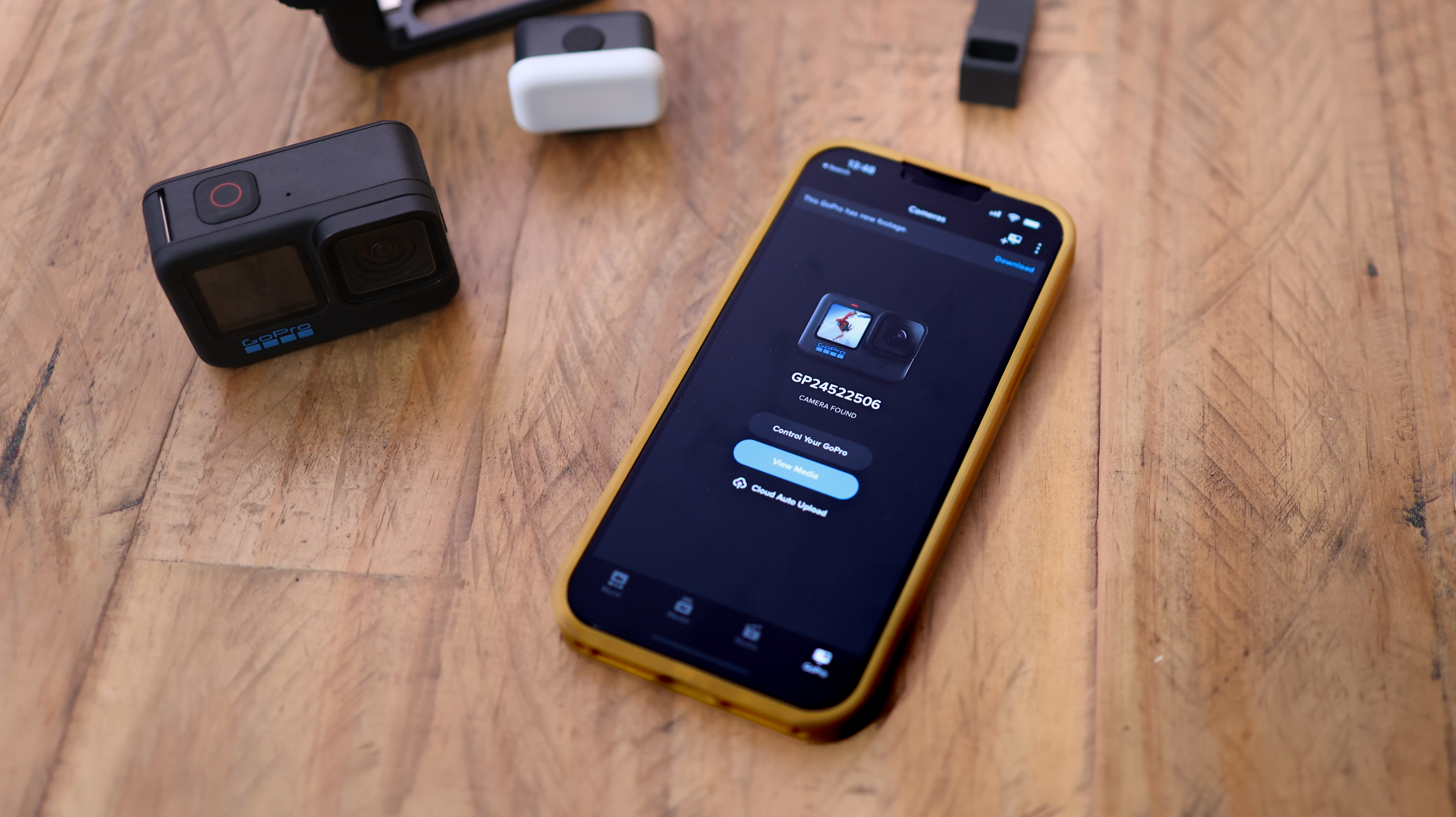 A photo of the GoPro app and the GoPro Hero10 Black
