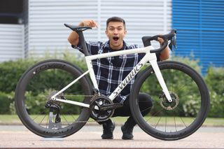 CW Video Editor Sam Gupta with a Specialized Tarmac SL8 road bike