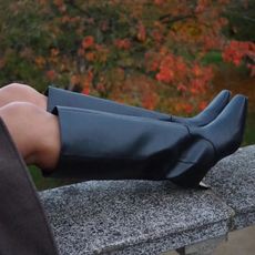 @astyleedit wears H&M's 2024 edition knee-high boots