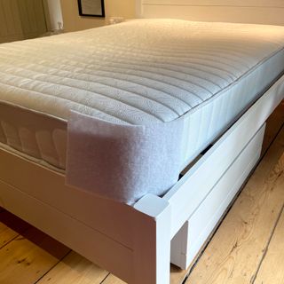 The Dreams Workshop Follows Traditional Spring Mattress on a bed